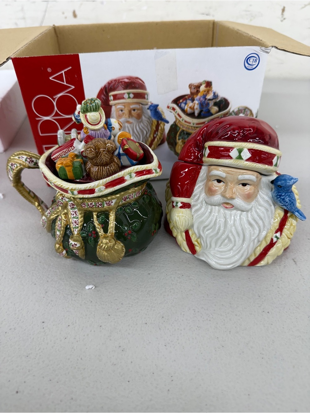 Studio Nova Creamer and sugarRed & Green Santa with Blue Bird Accent